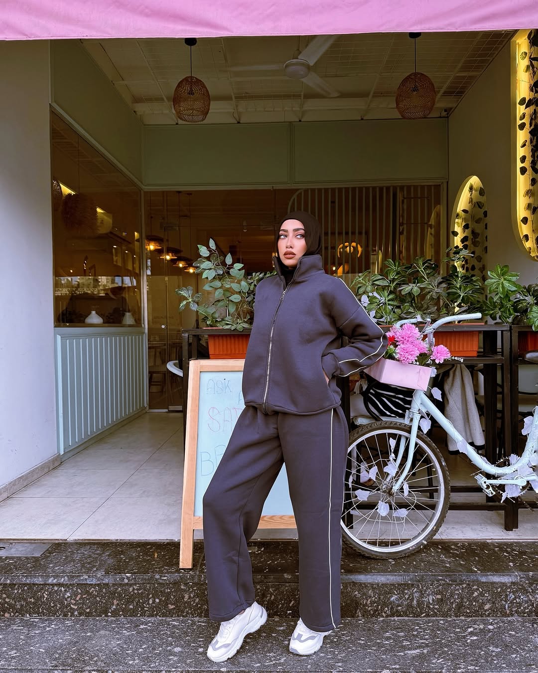Model wearing the charcoal co-ord set on location in Egypt