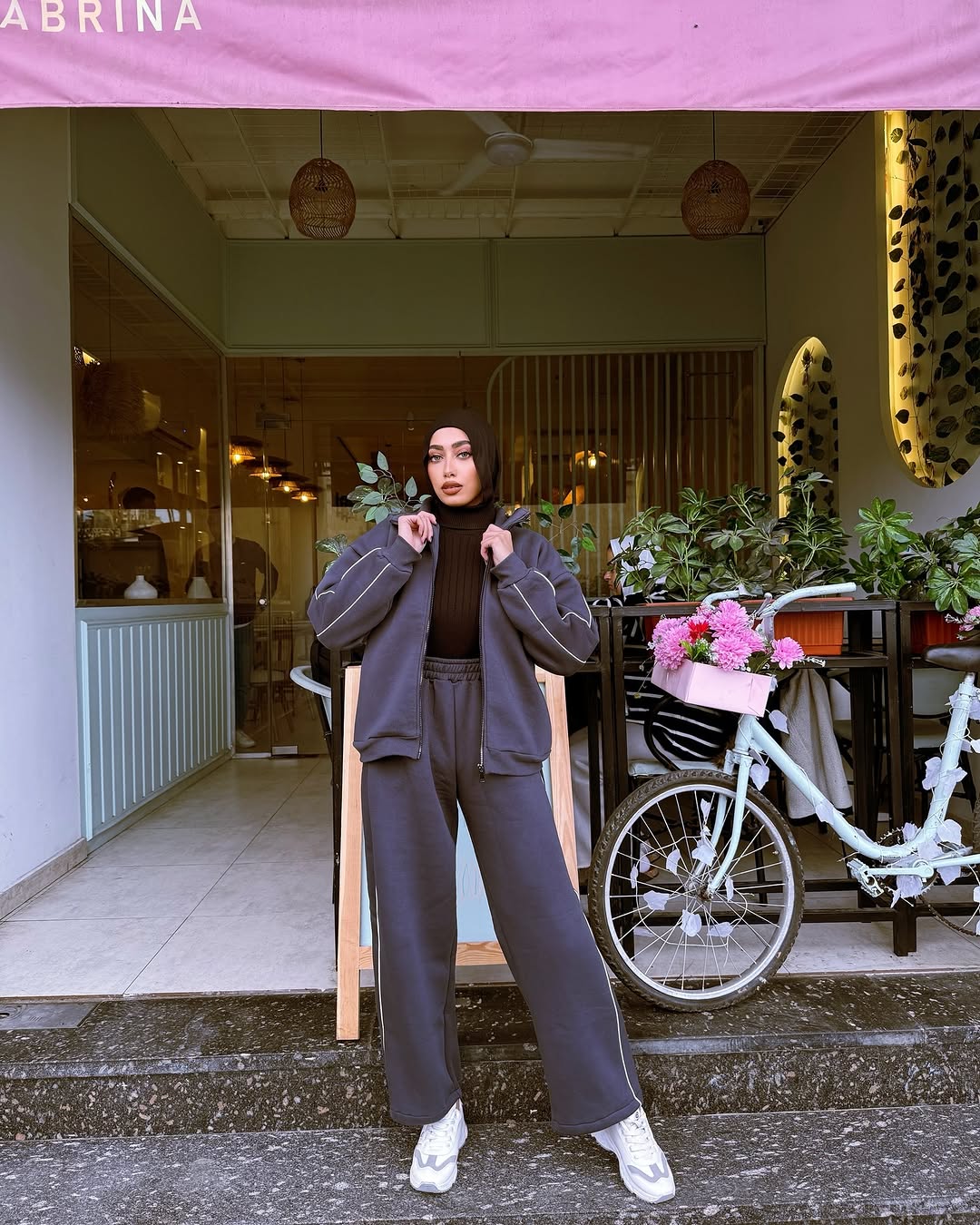 Model in a charcoal co-ord loungewear set at golden hour