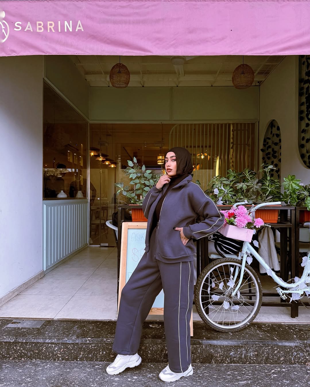 Model wearing the charcoal Tryout Fit co-ord set on location